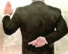 a politician taking an oath while having his fingers crossed behind his back