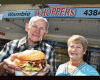 Creators of the Wambie Whopper Kevin and Maree Dean outside the Wamberal take-away shop. Picture: Phil Hearne